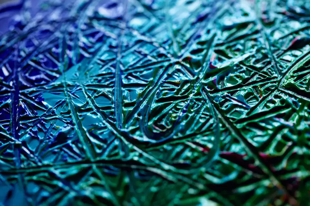 Detailed glass smalti portrait showing vibrant colors and dense texture